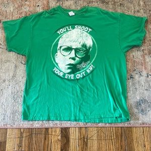 A Christmas story shirt. “ you’ll shoot your eye out. By Gildan heavy cotton.